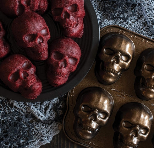 Nordic Ware Halloween Bakeware - Haunted Skull Cakelet Pan in Bronze