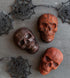 Nordic Ware Halloween Bakeware - Haunted Skull Cakelet Pan in Bronze