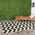 SAFAVIEH Courtyard Collection Runner Rug - 2'3" x 6'7", Black & Beige, Chevron Design, Non-Shedding & Easy Care,